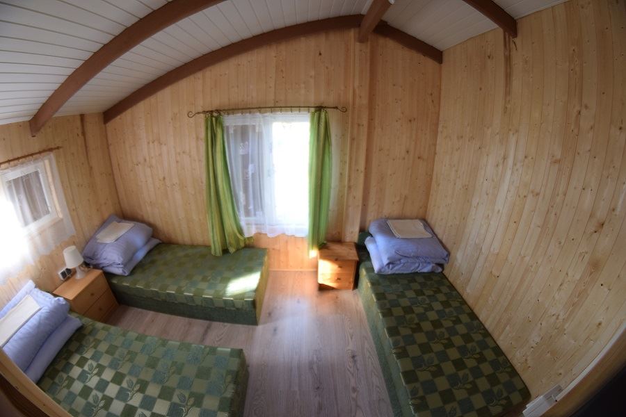 Pokój w domku letniskowym nad jeziorem Krzemień